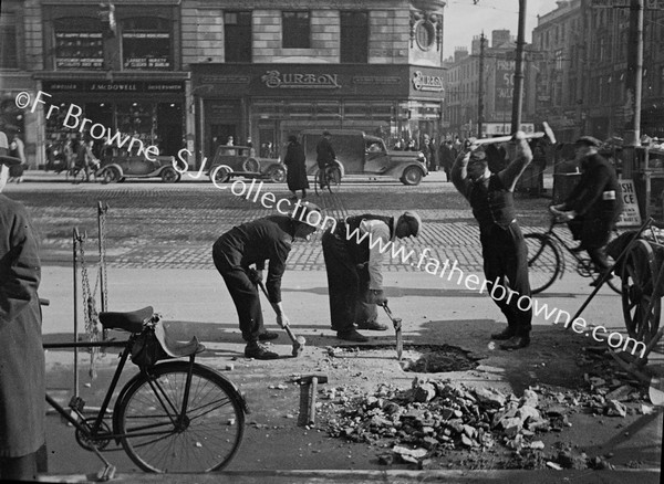 WORKMEN DIGGING UP O'CONNELL ST  BURTON'S TAILORS  MC DOWALL'S JEWELLERS